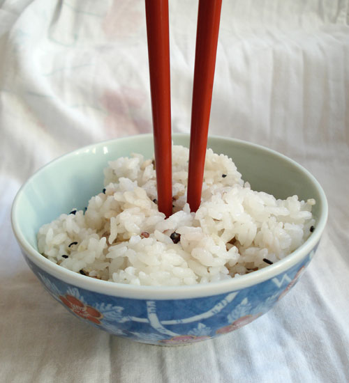 image: chopsticks stuck into a bowl of rice is a no-no
