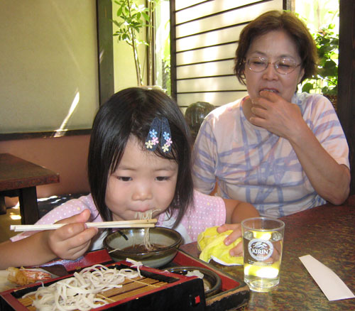 My niece eating soba, circa 2007. Little girl eating soba